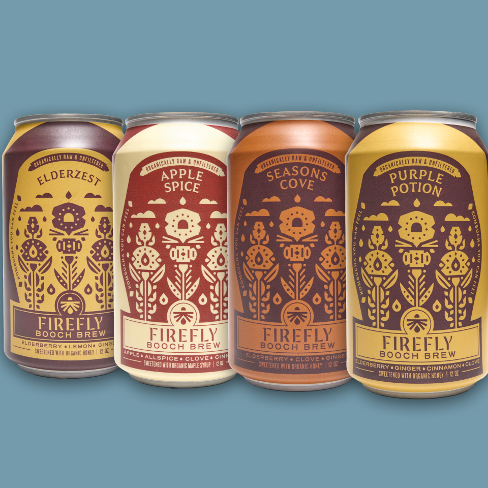 Four distinct Firefly Brew kombucha cans with colorful designs
