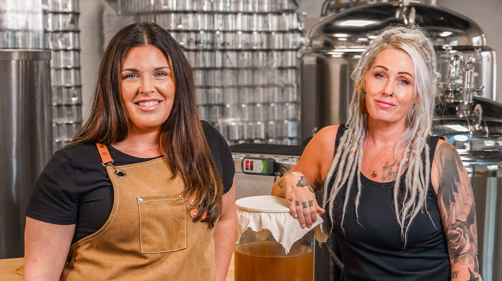Two women brewing kombucha at Firefly Brew in Oklahoma.